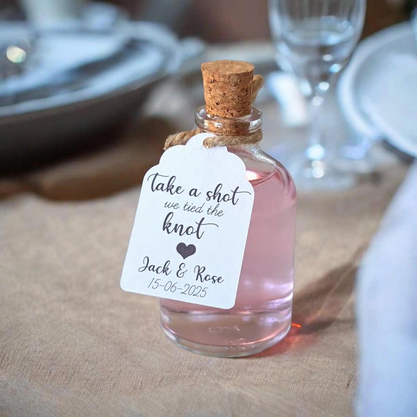 - Customisable Wedding Shot Bottles – Unique Party Favours
These elegant 50ml wedding favour bottles offer a little extra room for a healthy pour—perfect for creating a signature drink to delight your guests throughout the night.