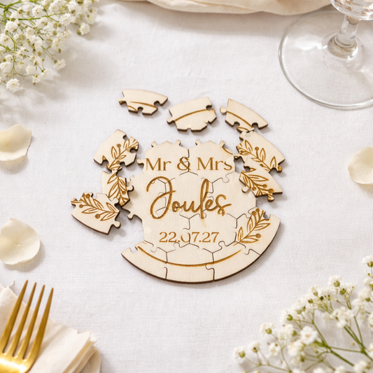 personalised wooden puzzle wedding favour with 'Mr & Mrs' and personalised name on a wedding table with flowers and cutlery.