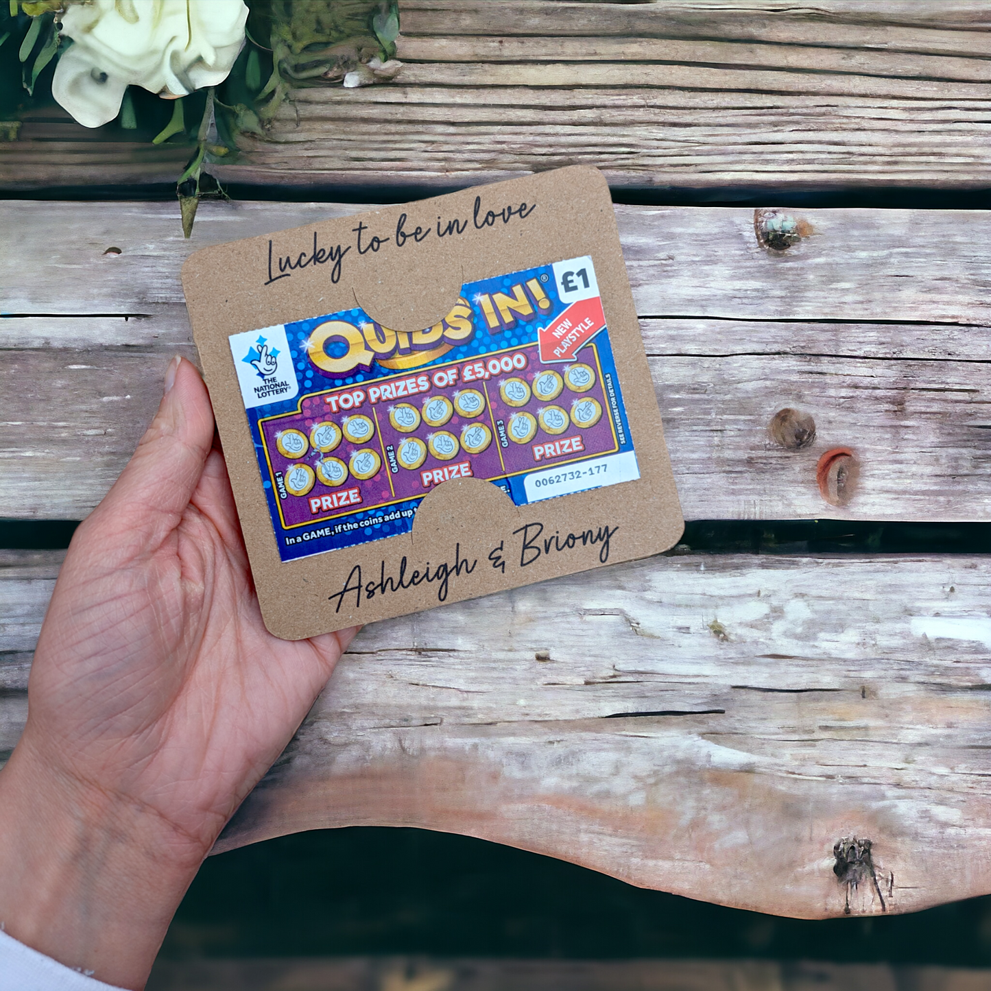 personalised scratch card wedding favour in kraft card on a rustic wooden background