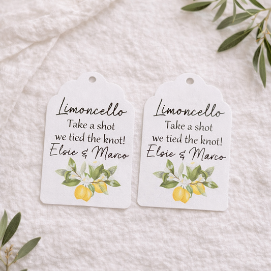 Two white tags with limoncello inspired illustrations and personalized text for weddings