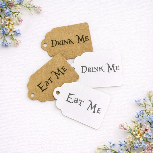 Mini bottle tags with 'Drink Me', 'Eat Me' text on a white background with flowers.