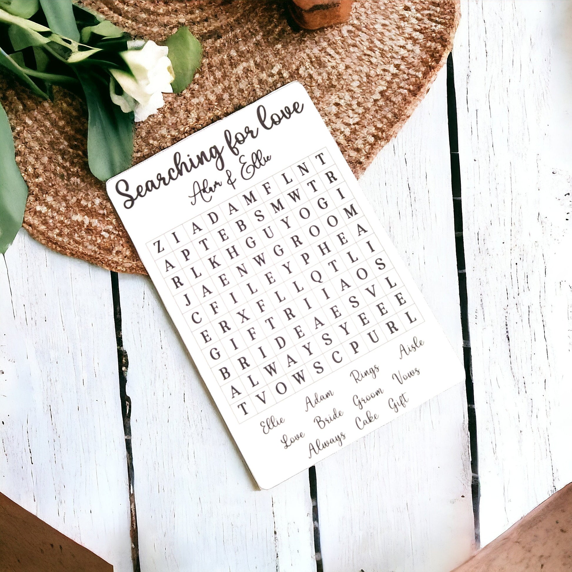 Wedding table game for guests with a word search and customised bride and groom's names