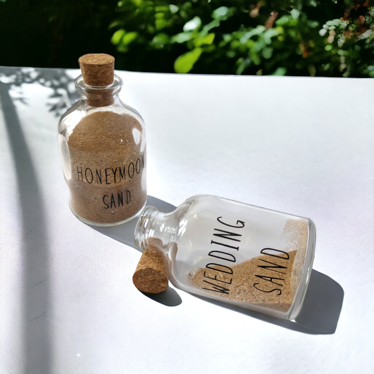 glass bottles filled with sand from a honeymoon and wedding. A cheap thoughtful gift for a married couple