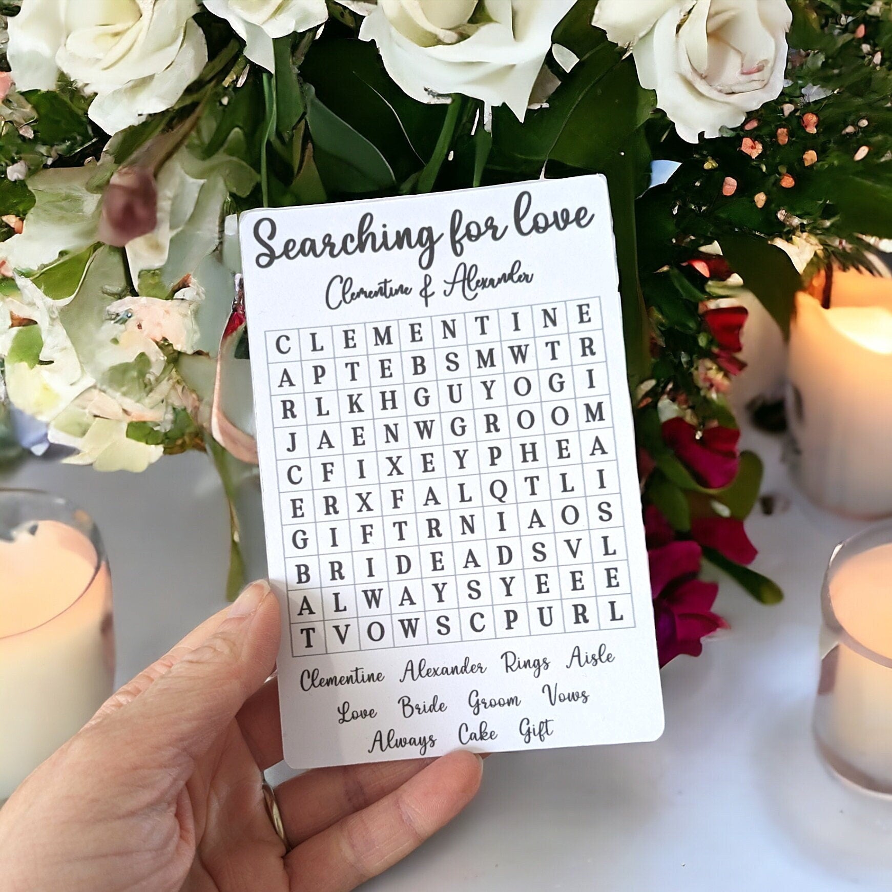 A customised wedding favour table game on white card. Each favour is customised with the bride and groom's name