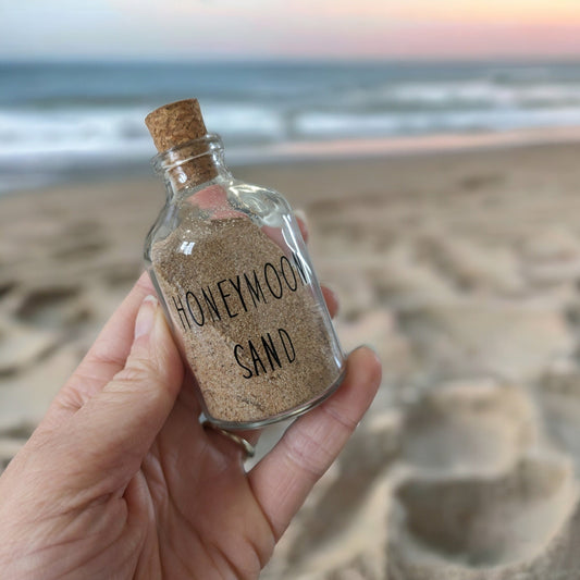 small glass bottle to fill with sand from honeymoon