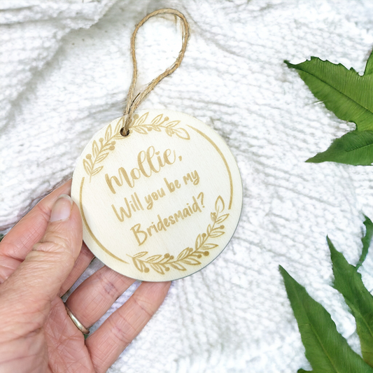 engraved wooden brdesmaid disc to tie onto champagne or in bridesmaid box