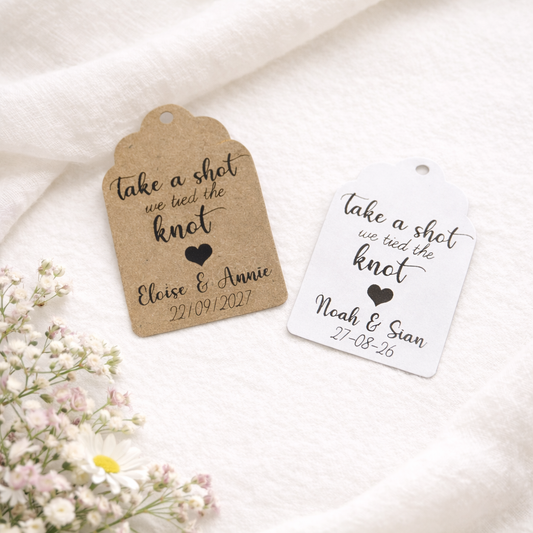 personalised wedding favour tags on white background with floral details