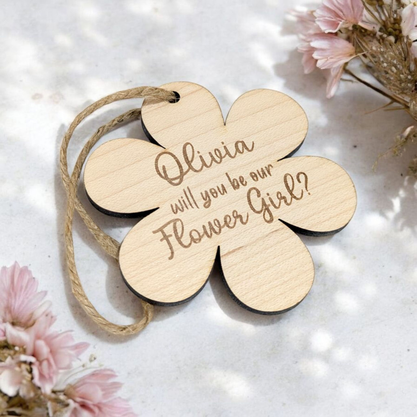 cute flower girl proposal gift on a white background with floral details