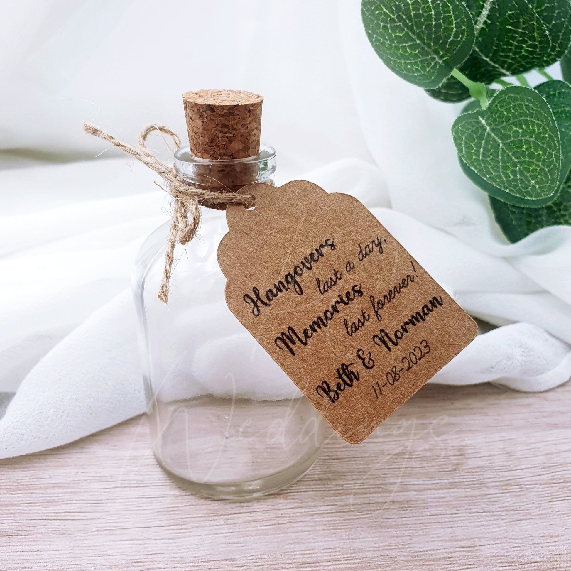 Charming wedding keepsake - Personalised alcohol bottle with custom tag