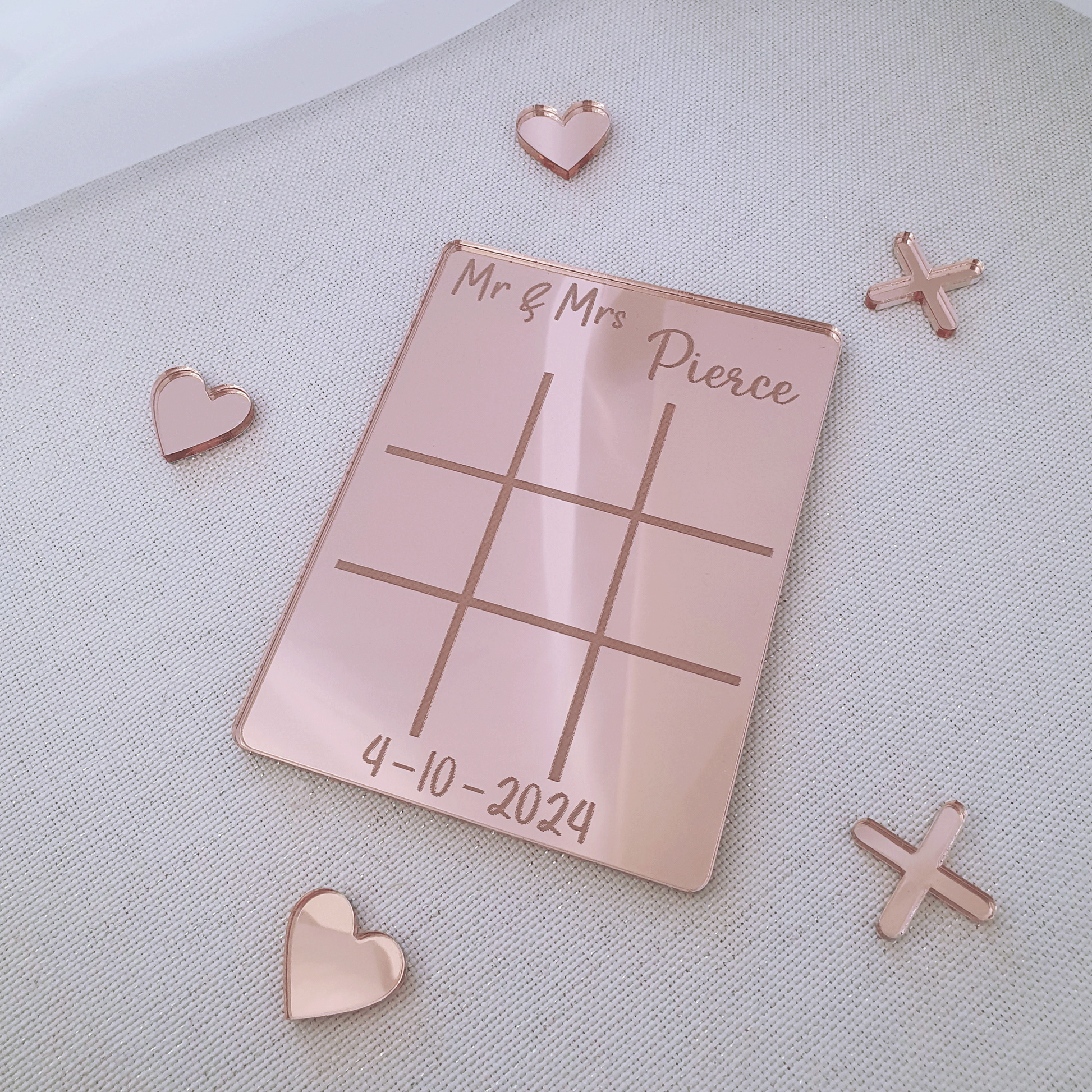 Rose gold acrylic wedding favour personalised wedding table game. Customised with couple's name and wedding date.