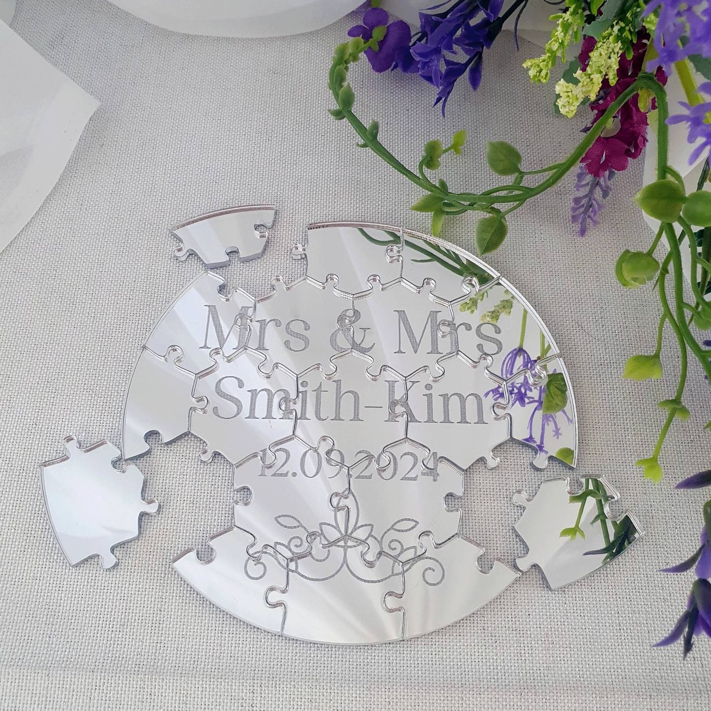 Mirrored acrylic wedding puzzle featuring couple's names and date