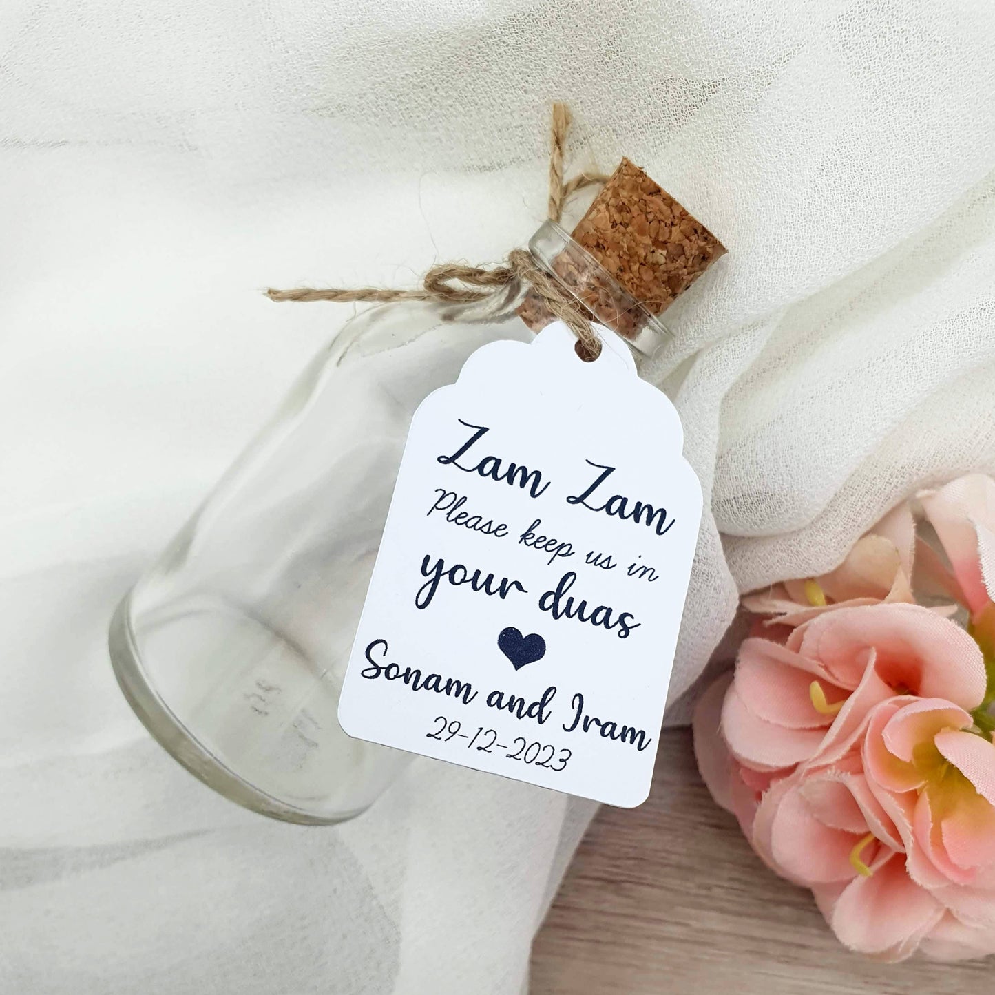 Zam zam water bottle with white customised tag and bottle for wedding guest gift